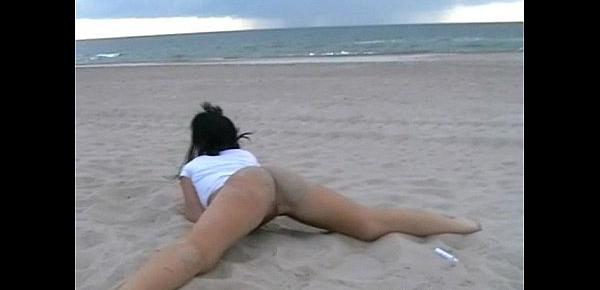  Beach babe Crystel Lei pissing pants and masturbating by the sea with naughty br